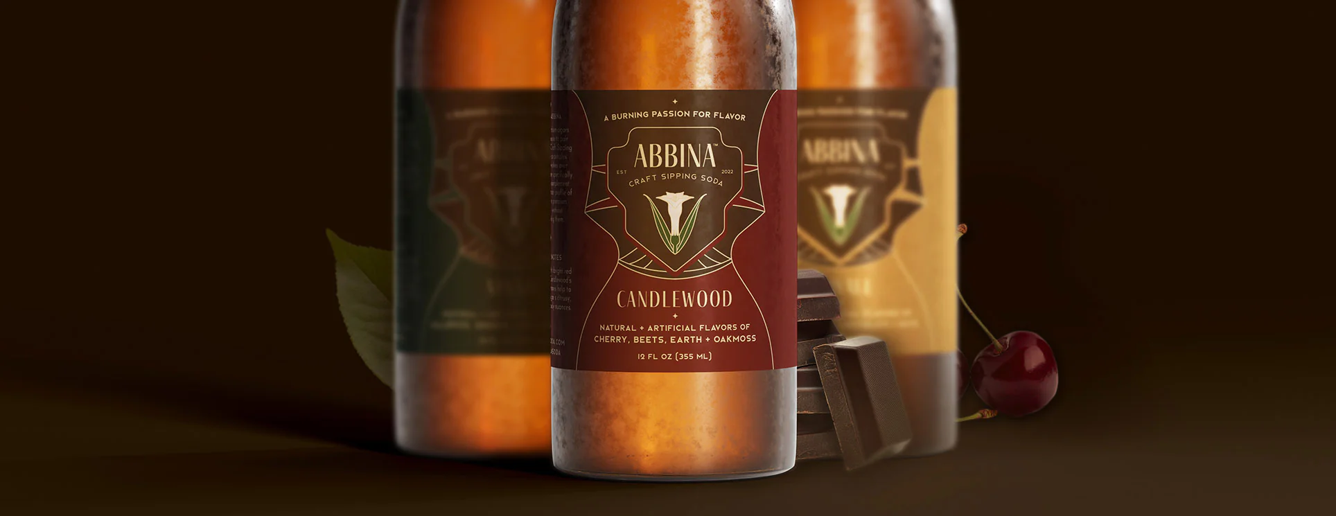 Abbina bottles with cigar and lounge setting