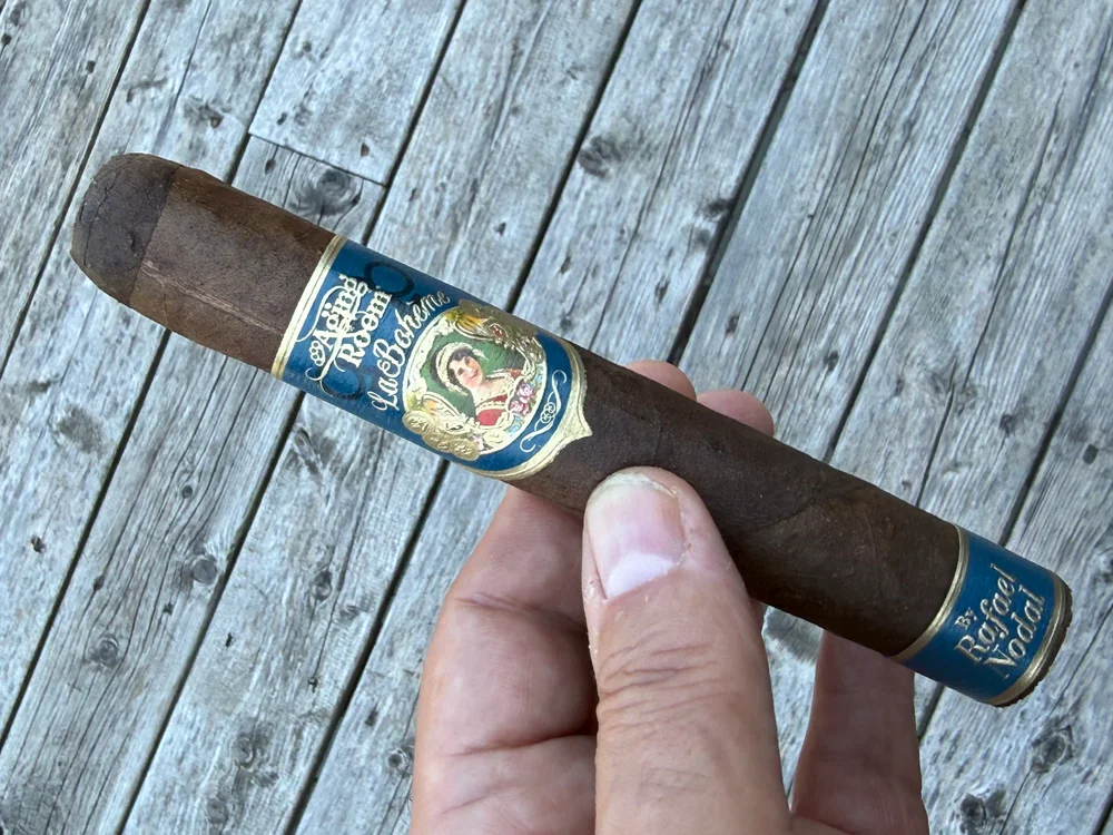 The Aging Room La Boheme Poeta in hand on Norm's porch, six months out of the humidor