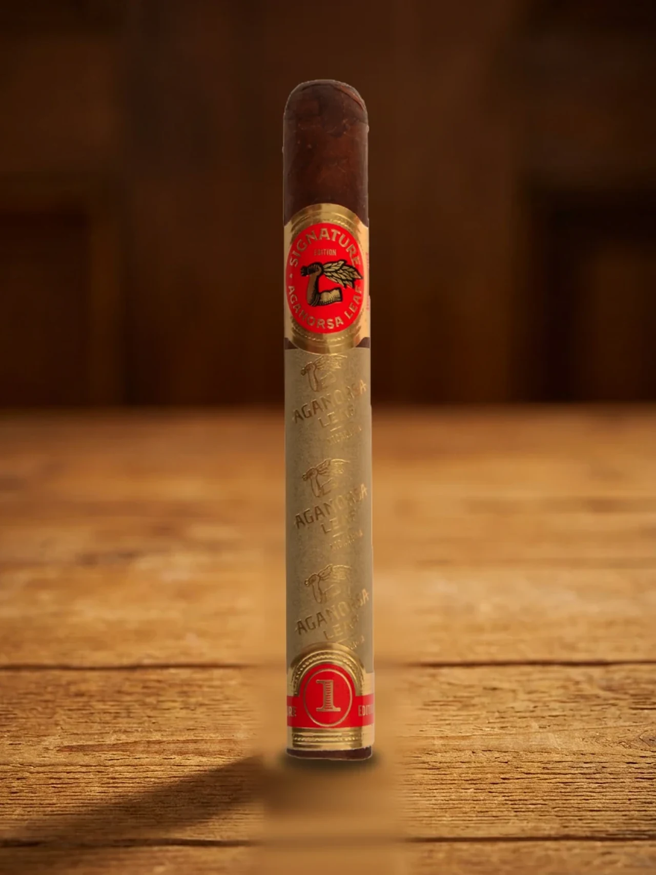 Aganorsa Leaf Signature Selection Corojo Toro unlit, standing on a wood table
