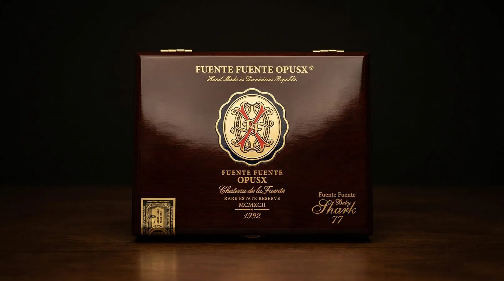 Fuente Fuente OpusX No. 77 Baby Shark cigar box, dark mahogany finish with the gold and red OpusX crest