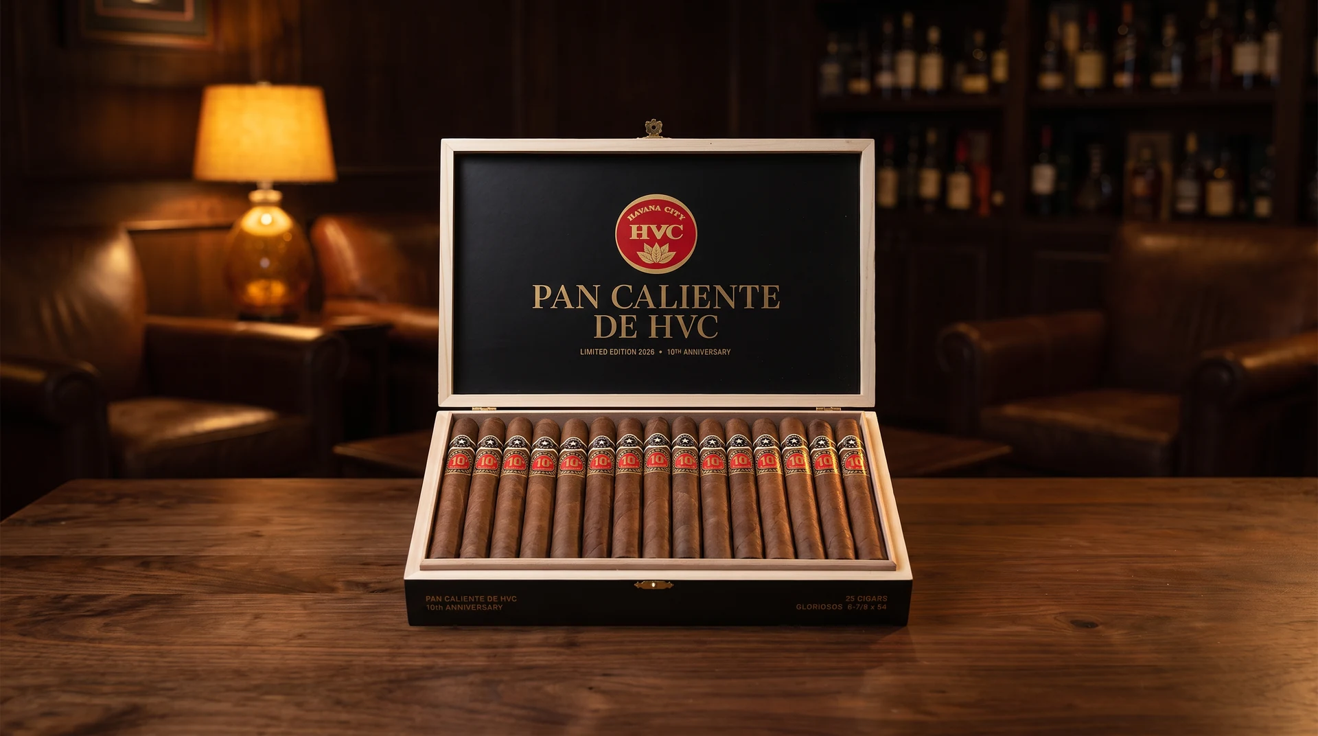 Pan Caliente de HVC 10th Anniversary box of 25 cigars, black lid panel with the red HVC Havana City roundel and gold lettering