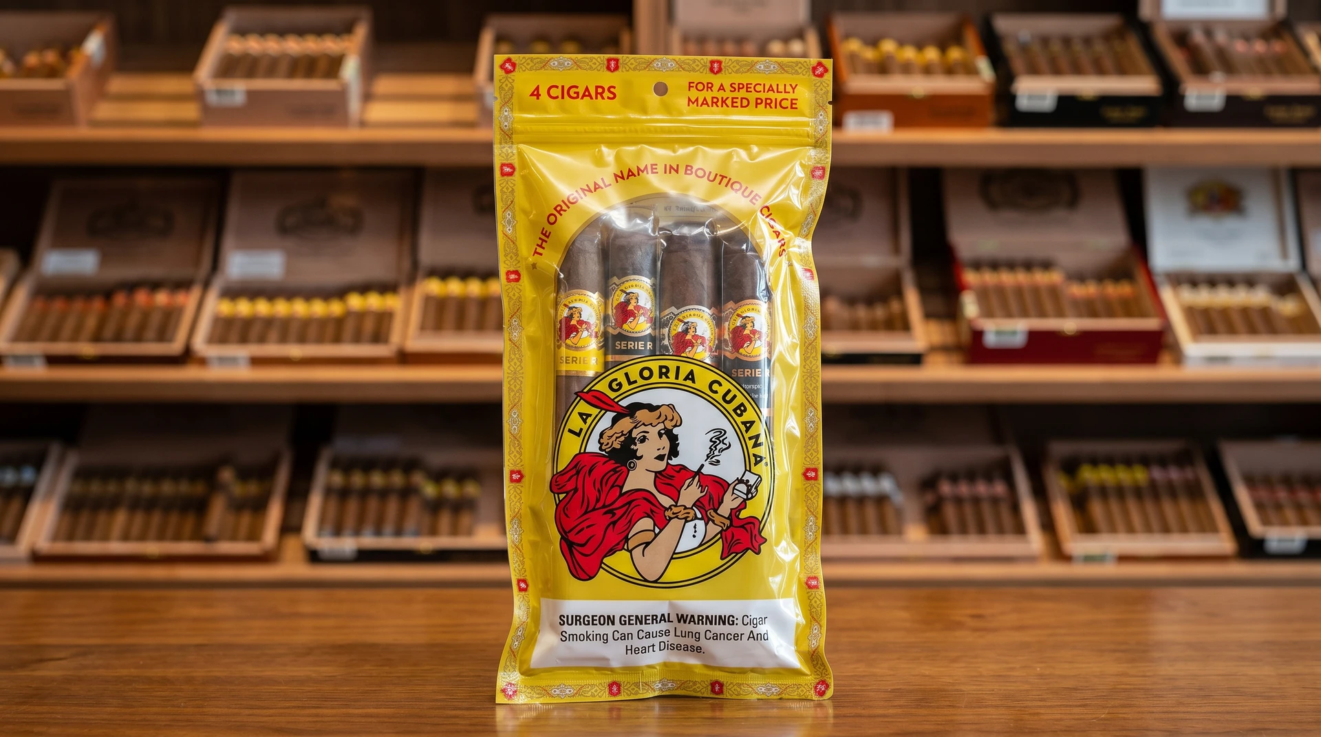 La Gloria Cubana fresh pack sampler, a humidified pouch with a clear window showing four cigars and the La Gloria Cubana lady emblem
