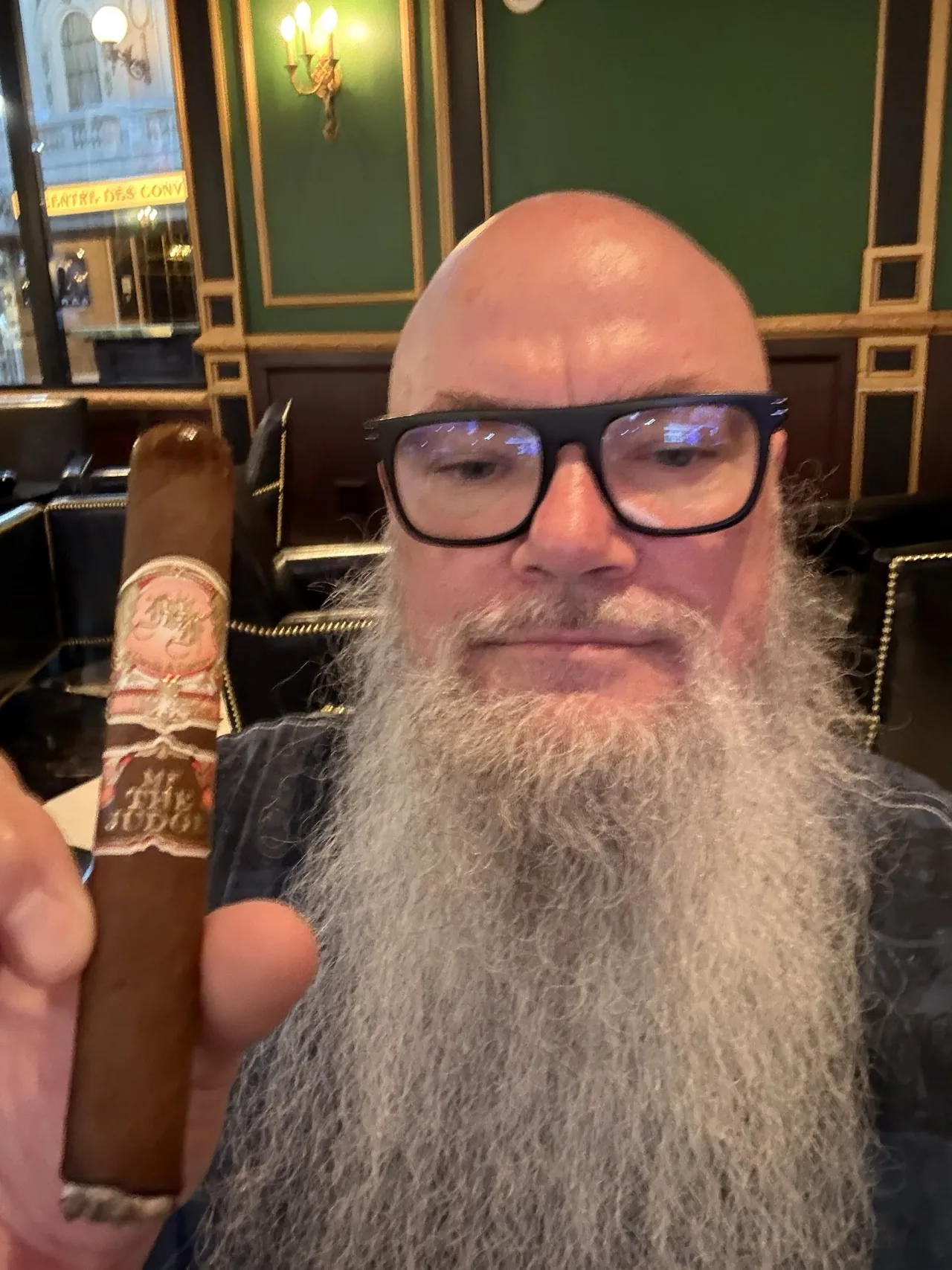 Norm Farrar holding a My Father The Judge Grand Robusto at the Montecristo Cigar Lounge in the Paris Hotel, Las Vegas