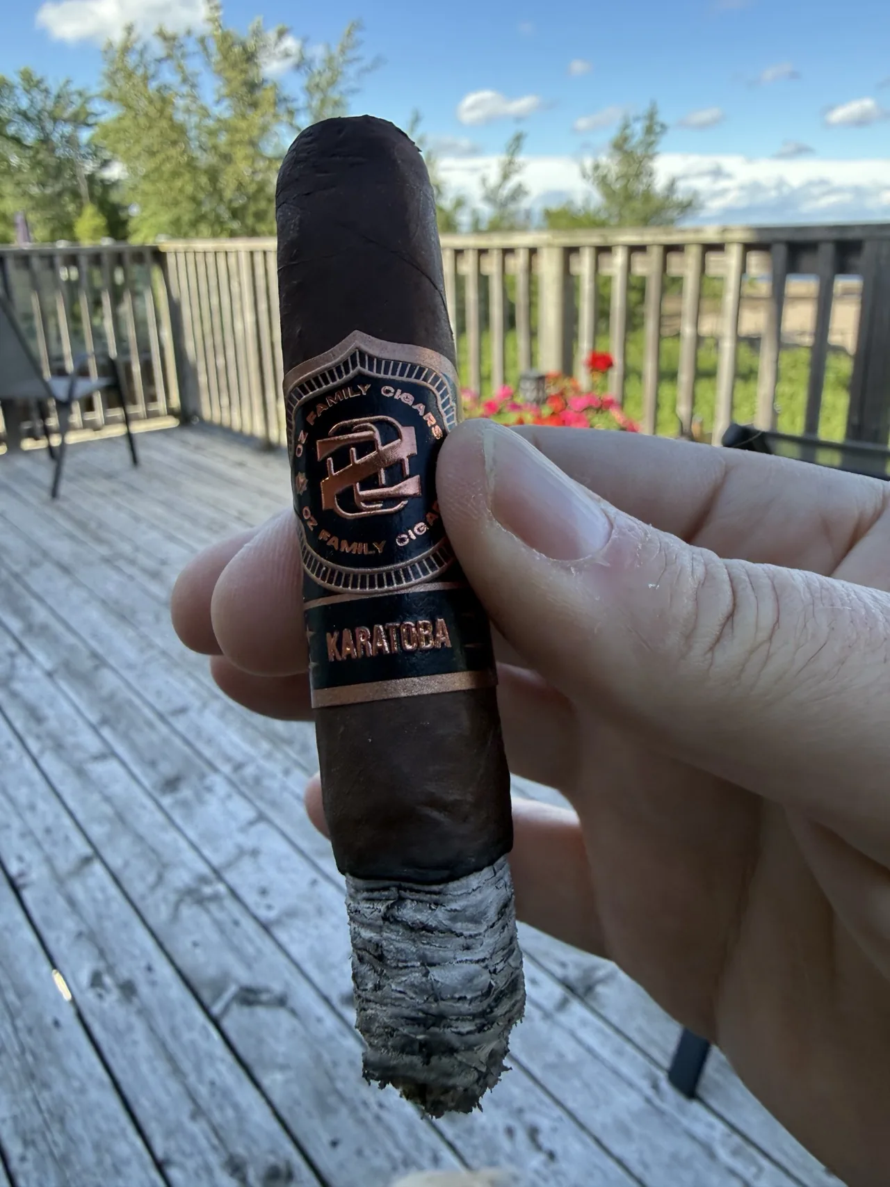 OZ FAMILY KARATOBA K60 GORDO 6&times;60 lit on the porch, black and copper Karatoba band in view
